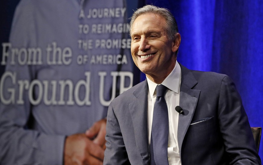 Former Starbucks CEO and Chairman Howard Schultz smiles as he is introduced during the kickoff of his book tour, Monday, Jan. 28, 2019, in New York. Democrats across the political spectrum lashed out  ...