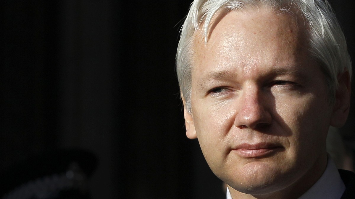FILE - WikiLeaks founder Julian Assange pauses as he makes a statement to media gathered outside the High Court in London, on Dec. 5, 2011. Australia