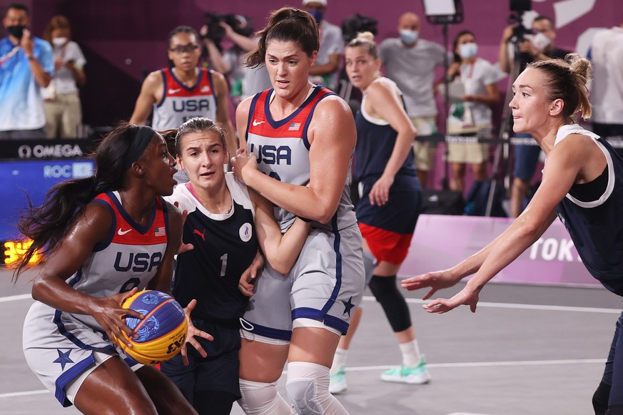 epa09374355 Jackie Young (L) and Stefanie Dolson (2-R) of the United States in action against Anastasia Logunova (R) and Yulia Kozik (2-L) of Russia during the Women&#039;s Gold Medal Game between the ...