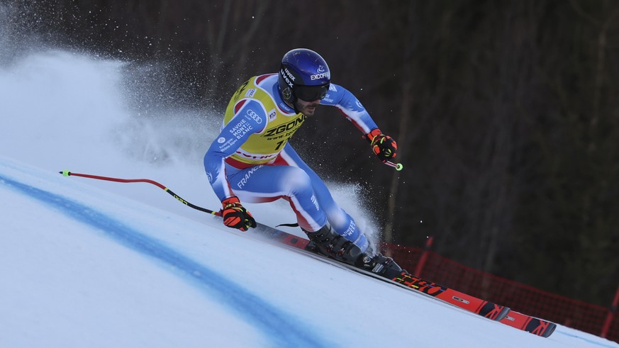 France&#039;s Cyprien Sarrazin speeds down the course during an alpine ski, men&#039;s World Cup downhill training, in Bormio, Italy, Friday, Dec. 27, 2024. (AP Photo/Marco Trovati)