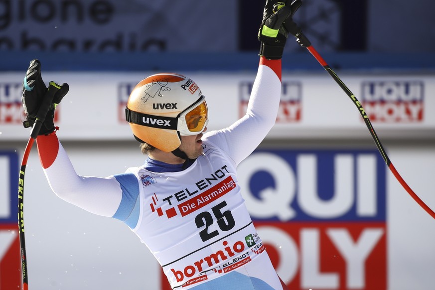 Switzerland&#039;s Urs Kryenbuehl celebrates at the finish area of an alpine ski, men&#039;s World Cup downhill, in Bormio, Italy, Saturday, Dec. 28, 2019. (AP Photo/Alessandro Trovati)