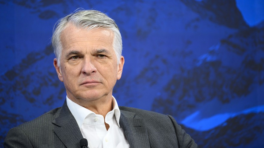 epa11084861 Swiss Bank UBS Group Chief Executive Officer Sergio Ermotti looks on during a panel session of the 54th annual meeting of the World Economic Forum (WEF), in Davos, Switzerland, 17 January  ...