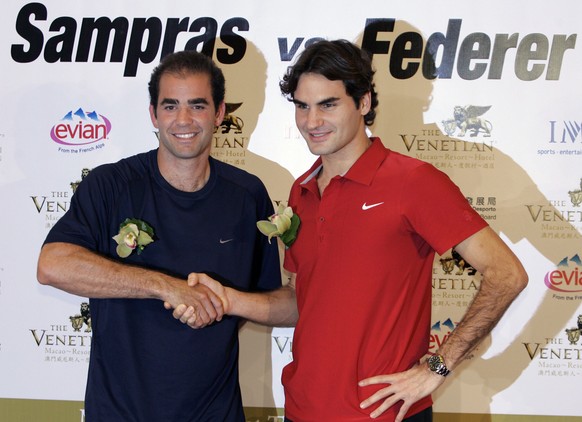 FILE -- This Nov. 23, 2007 file photo shows tennis players Roger Federer of Switzerland, right, and Pete Sampras of the United States, posing at a news conference at the Venetian Macao Resort in Macau ...