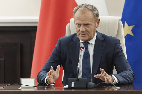 Polish Prime Minister Donald Tusk holds an extraordinary government meeting at the chancellery, with military and emergency services officials, following violations of Polish airspace during a Russian ...