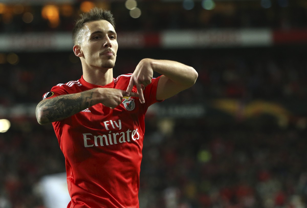 Benfica's Alex Grimaldo celebrates after scoring his side's third goal during the Europa League round of 16, second leg, soccer match between Benfica and Dinamo Zagreb at the Luz stadium in  ...
