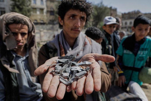 A Yemeni shows remains of one of the shells from a location reportedly struck by U.S. airstrikes in Sanaa, Yemen, Sunday, April 20, 2025. (AP Photo)
Yemen Mideast Wars