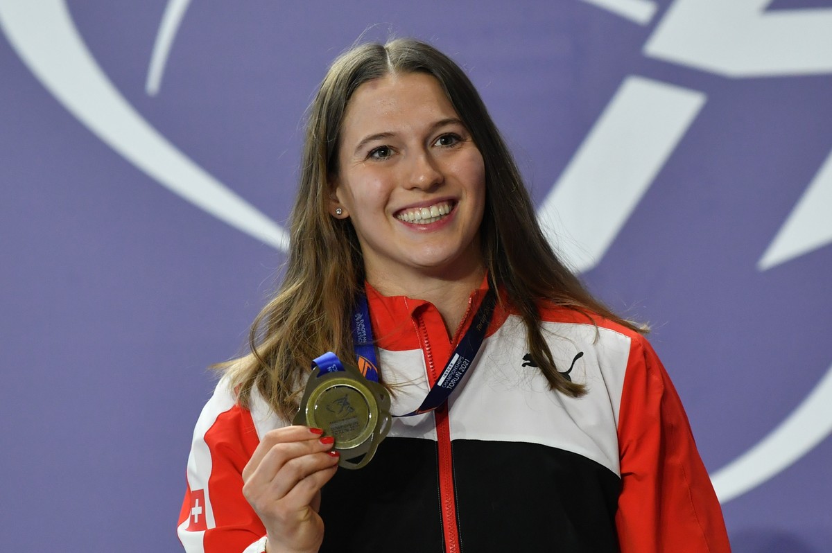 epa09058651 Gold medalist Angelica Moser of Switzerland celebrates during the medal ceremony for the Women's Pole Vault at the 36th European Athletics Indoor Championships at the Arena Torun, in  ...