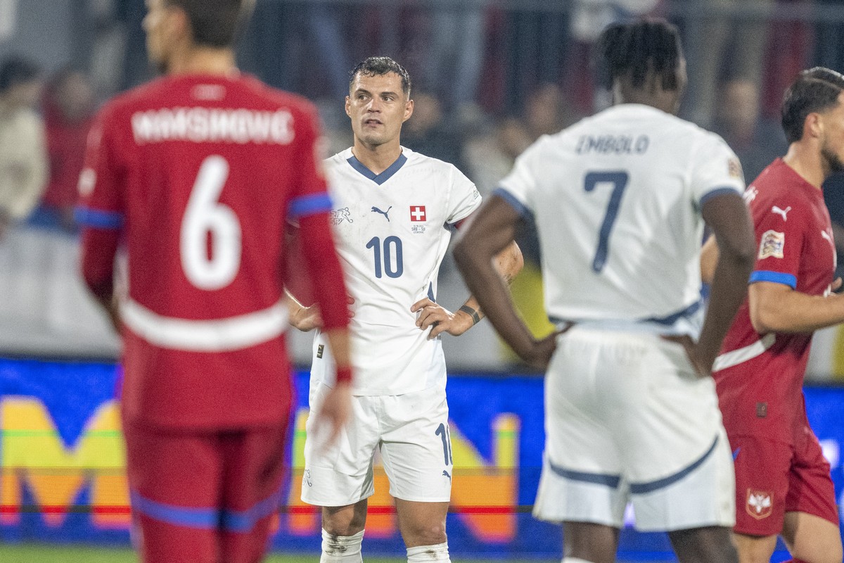 Granit Xhaka, centre, from Switzerland reacts after the 2:0 goal for Serbia during the UEFA Nations League group A4 qualifying soccer match between Serbia and Switzerland, at the Dubocica Stadium, in ...