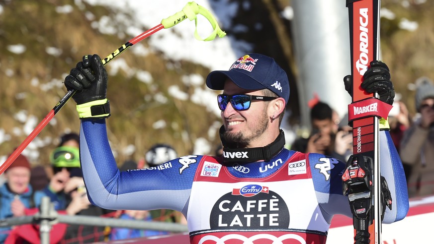 Second placed Italy's Dominik Paris celebrates at the end of an alpine ski, World Cup men's downhill in Wengen, Switzerland, Saturday, Jan. 18, 2020. (AP Photo/Marco Tacca)