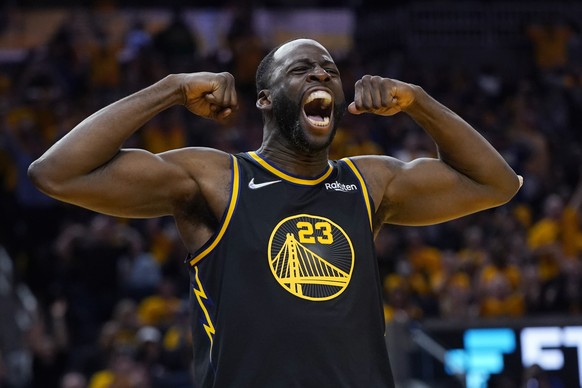 File - Golden State Warriors forward Draymond Green celebrates after scoring against the Dallas Mavericks during the second half of Game 5 of the Western Conference Finals for the NBA playoffs in...