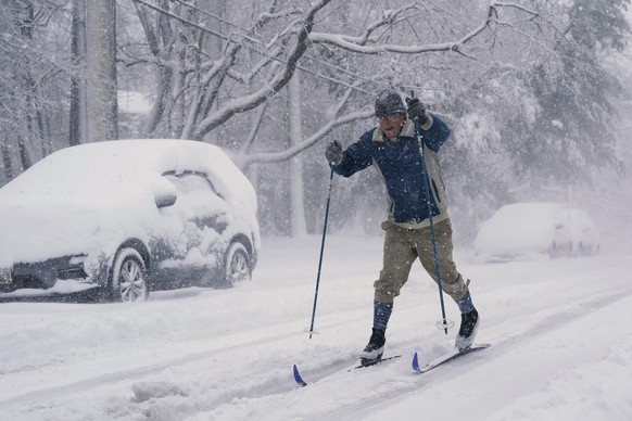 James Penn of Annapolis, Md., cross country skis in Annapolis, Md., Monday, Jan. 3, 2022. A winter storm packing heavy snow rolled into the District of Columbia, northern Virginia and central Maryland ...