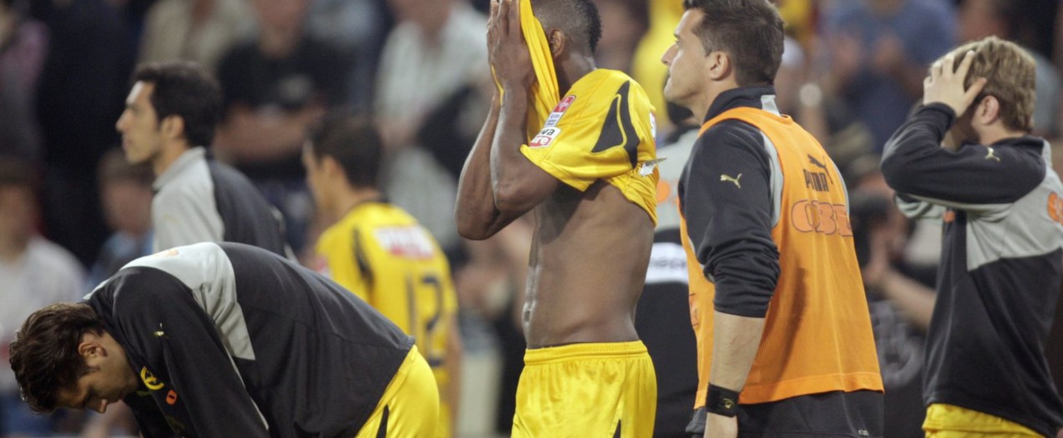 Young Boys players look on in dejection after their defeat in the final round Swiss Super League soccer match FC Basel - BSC Young Boys at the St. Jakob Park stadium in Basel, Switzerland, Saturday, M ...