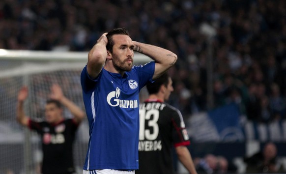 FC Schalke 04&#039;s Christian Fuchs reacts during their Bundesliga first division soccer match against Bayer Leverkusen in Gelsenkirchen March 21, 2015. REUTERS/Ina Fassbender DFL RULES TO LIMIT THE  ...