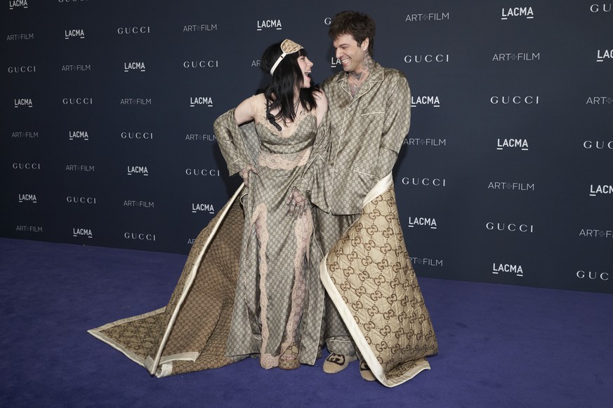 Billie Eilish, left, and Jesse Rutherford arrive at the LACMA Art+Film Gala on Saturday, Nov. 5, 2022, at the Los Angeles County Museum of Art in Los Angeles. (AP Photo/Allison Dinner)