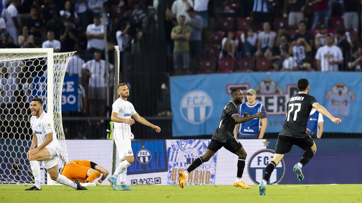 epa10094451 Qarabag FK's Kwabwena Owusu, 2nd right celebrates next to Ramil Sheydaev, right, after after scoring a goal against FC Zurich during the UEFA Champions League qualifying second round, ...