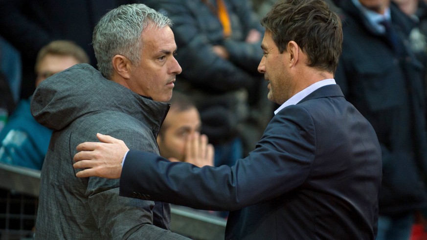 epa05918072 Manchester United manager Jose Mourinho (L) greets Anderlecht manager Rene Weiler during the UEFA Europa League quarter final, second leg soccer match between Manchester United and RSC And ...