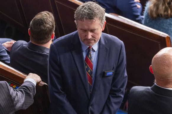 epa11803991 Republican Representative from Kentucky Thomas Massie votes against Speaker elect Mike Johnson during the Speaker election on the House floor of the US Capitol in Washington, DC, USA, 03 J ...