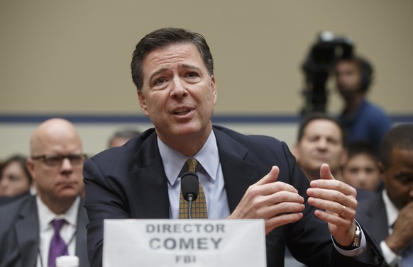 FILE - In this July 7, 2016 file photo, FBI Director James Comey testifies on Capitol Hill in Washington before the House Oversight Committee to explain his agency's recommendation to not prosecu ...