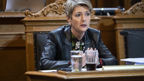 epa10569216 Swiss Finance Minister Karin Keller-Sutter speaks during an extraordinary session of the Federal Assembly in the Council of States in Bern, Switzerland, 12 April 2023. The extraordinary se ...