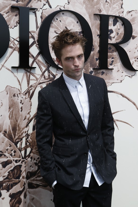 Actor Robert Pattinson poses during a photocall before Christian Dior Haute Couture Fall-Winter 2017/2018 fashion collection, Monday, July 3, 2017 in Paris. (AP Photo/Thibault Camus)