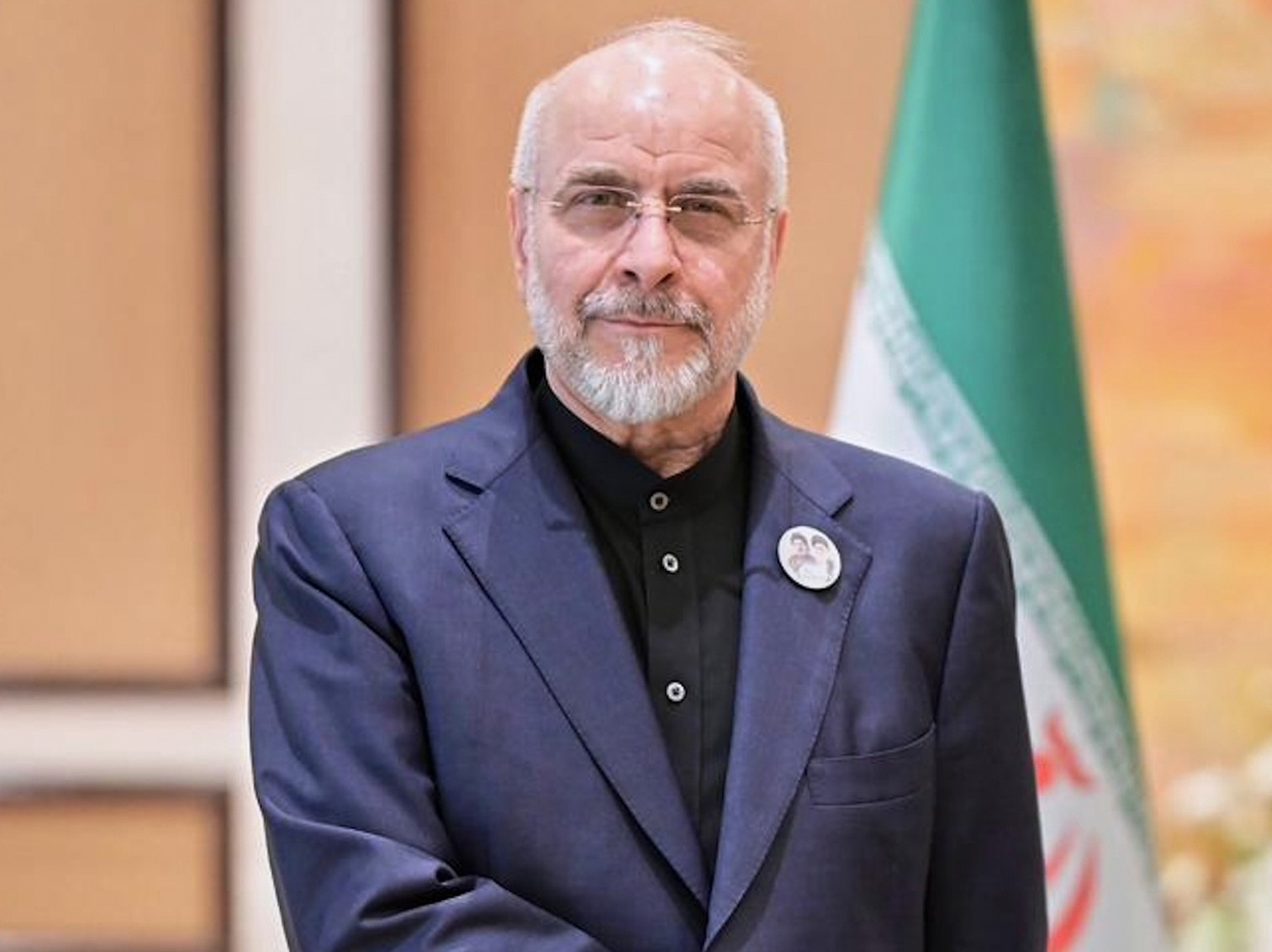 In this photo released by the Pakistan Prime Minister Office, Iran's Parliament Speaker Mohammad Bagher Ghalibaf, left, shakes hand with Pakistani Prime Minister Shehbaz Sharif prior to their mee ...