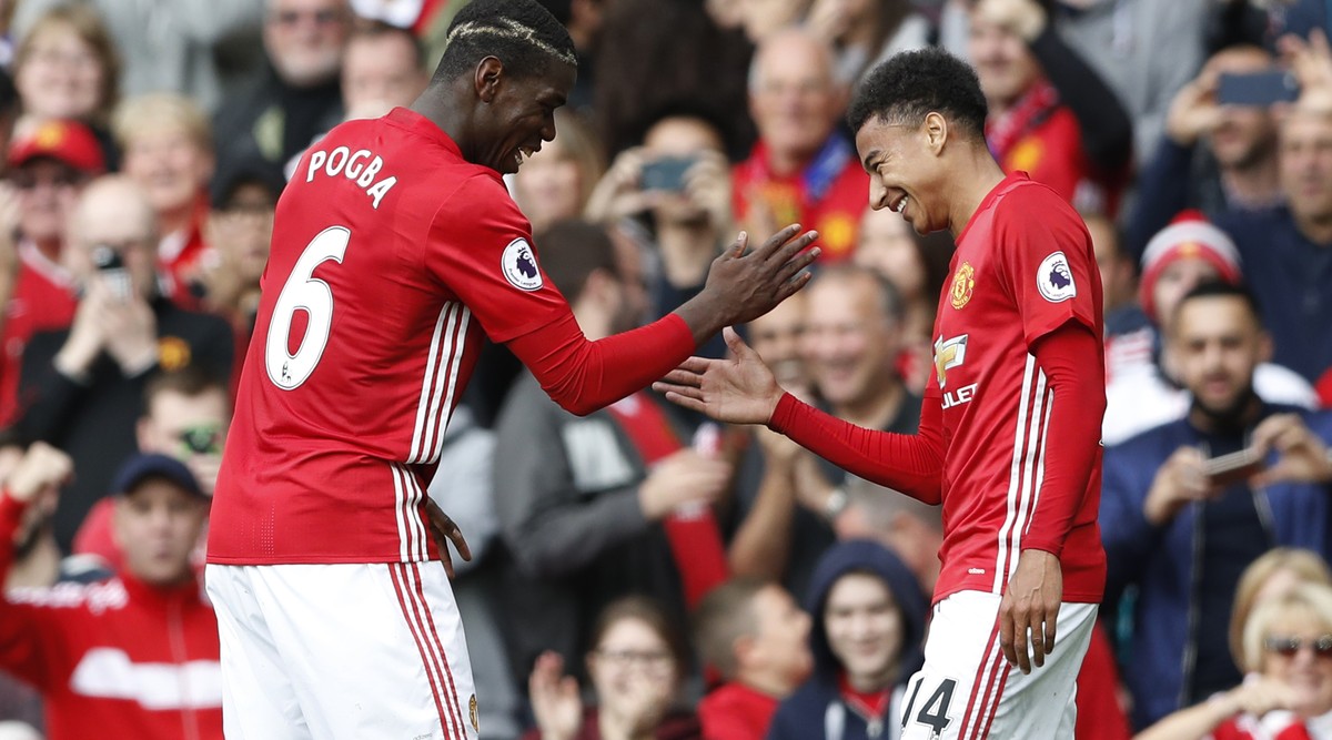 Britain Football Soccer - Manchester United v Leicester City - Premier League - Old Trafford - 24/9/16
Manchester United's Paul Pogba celebrates scoring their fourth goal with Jesse Lingard
Act ...