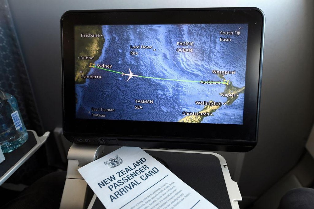 IN FLIGHT - APRIL 19: A screen aboard QANTAS flight QF143 displays the plane's fight path as it travels from Australia to New Zealand on April 19, 2021. The trans-Tasman travel bubble between New ...