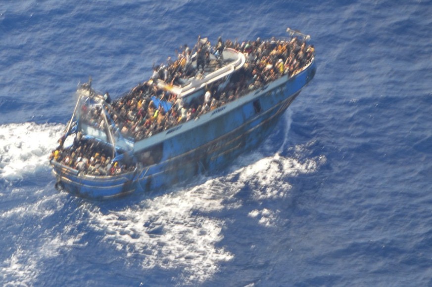 This undated handout image provided by Greece&#039;s coast guard on Wednesday, June14, 2023, shows scores of people on a battered fishing boat that later capsized and sank off southern Greece. A fishi ...