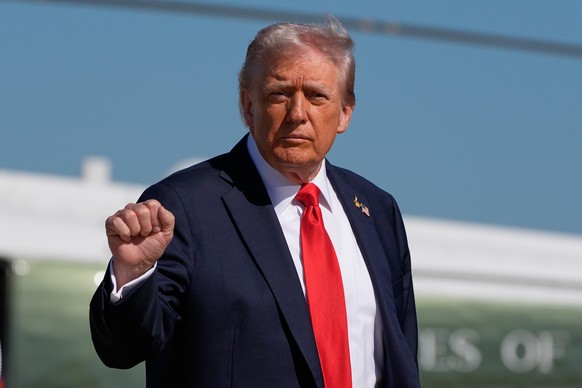President Donald Trump gestures as he boards Air Force One, Sunday, Oct. 5, 2025, at Joint Base Andrews, Md., en route to Norfolk, Va. (AP Photo/Alex Brandon)
Donald Trump