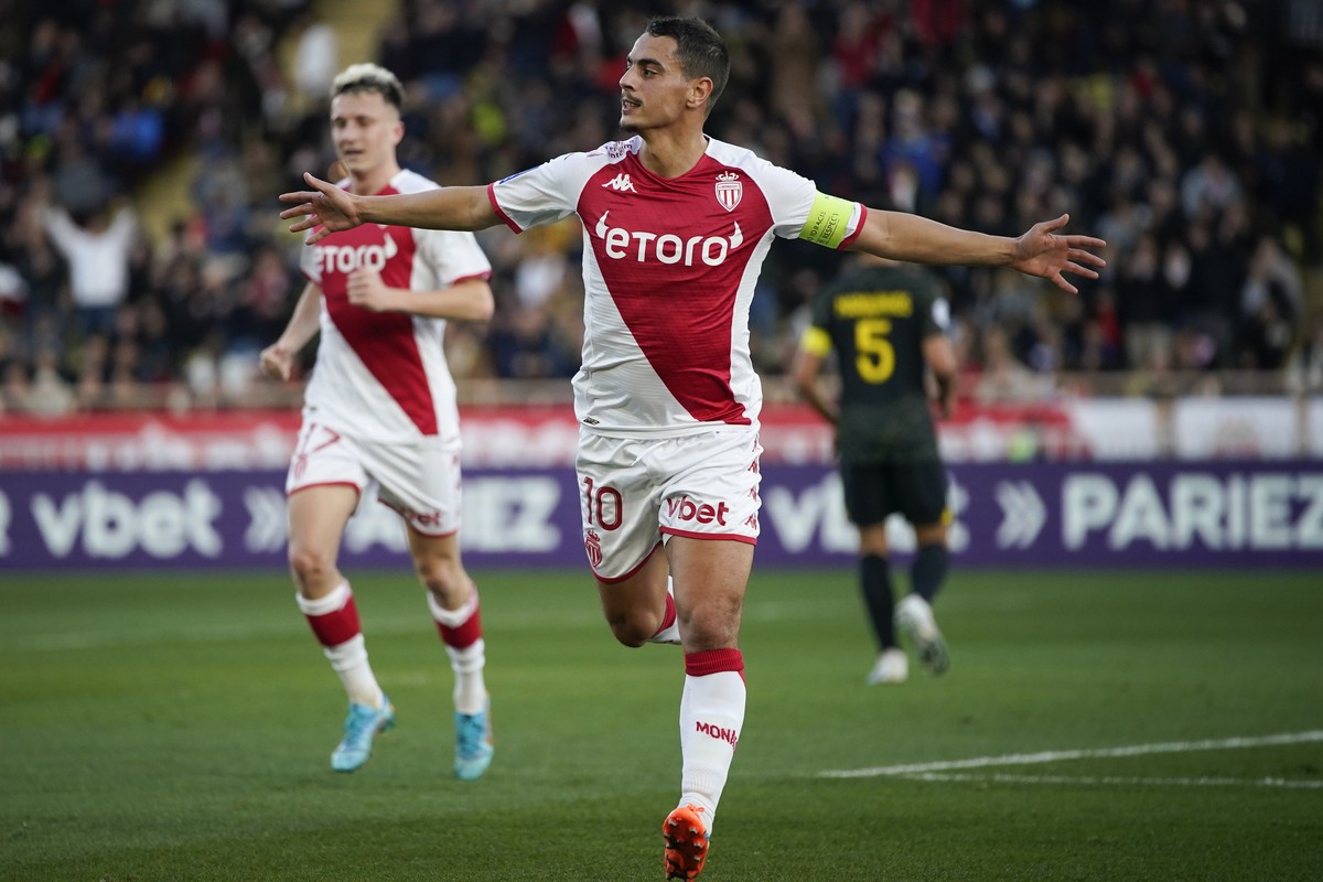 Monaco's Wissam Ben Yedder celebrates scoring his side's 2nd goal during a French League One soccer match between Monaco and Paris Saint-Germain at the Stade Louis II in Monaco, Saturday, Fe ...