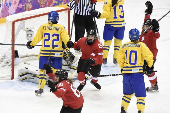 Switzerland&#039;s forward Phoebe Stanz, left, Switzerland&#039;s forward Alina Mueller, center, and Switzerland&#039;s forward Stefanie Marty, right, celebrate the second goal during the women&#039;s ...