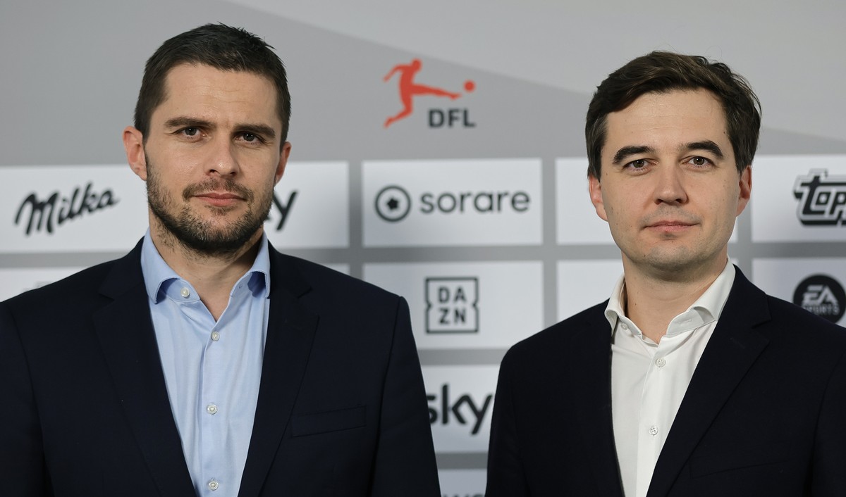 epa11022917 Managing Directors Marc Lenz (L) and Steffen Merkel (R) pose during a press conference following the General Assembly of Members of the German Football League (DFL) in Frankfurt Main, Germ ...