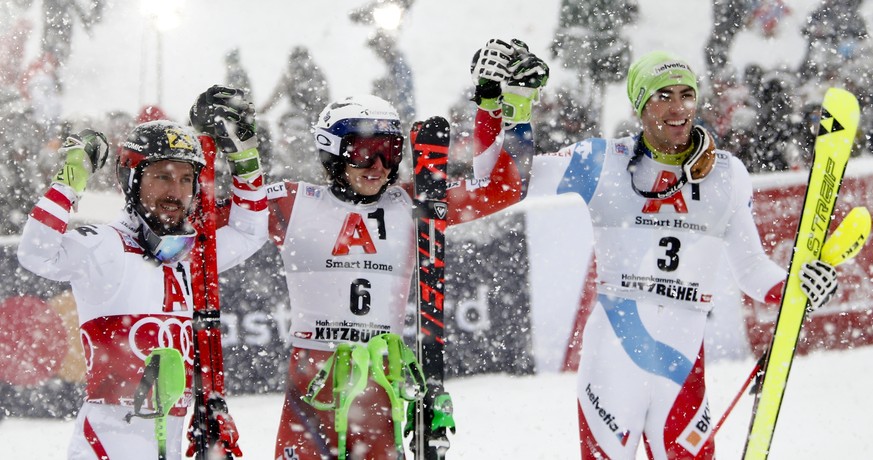 Norway&#039;s Henrik Kristoffersen, center, winner of an alpine ski, men&#039;s World Cup slalom, poses with second placed Austria&#039;s Marcel Hirscher, left, and third placed Switzerland&#039;s Dan ...