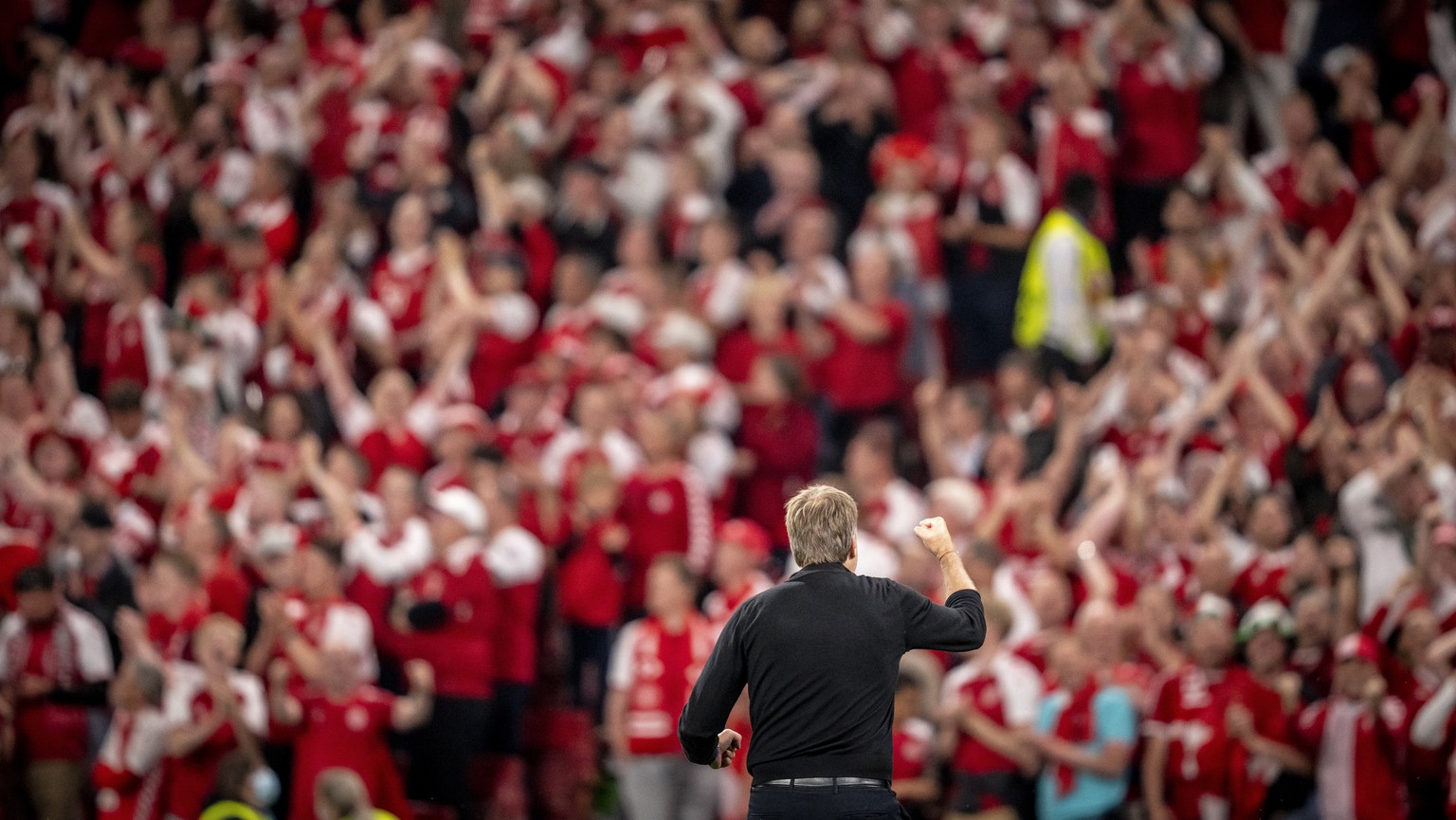 epa09292246 Danish coach Kasper Hjulmand reacts after the UEFA EURO 2020 group B preliminary round soccer match between Russia and Denmark in Copenhagen, Denmark, 21 June 2021. EPA/Mads Claus Rasmusse ...