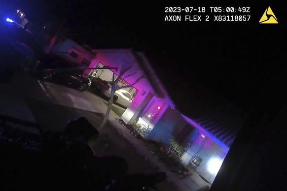 This Monday evening, July 17, 2023 image taken from police body camera video provided by the Las Vegas Metropolitan Police Department, shows a home SWAT officers raided in the nearby city of Henderson ...