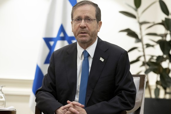 Israeli President Isaac Herzog speaks during a meeting with US Secretary of State Antony Blinken, in Tel Aviv, Israel, Thursday, November 30, 2023, after announcing an extension of the…