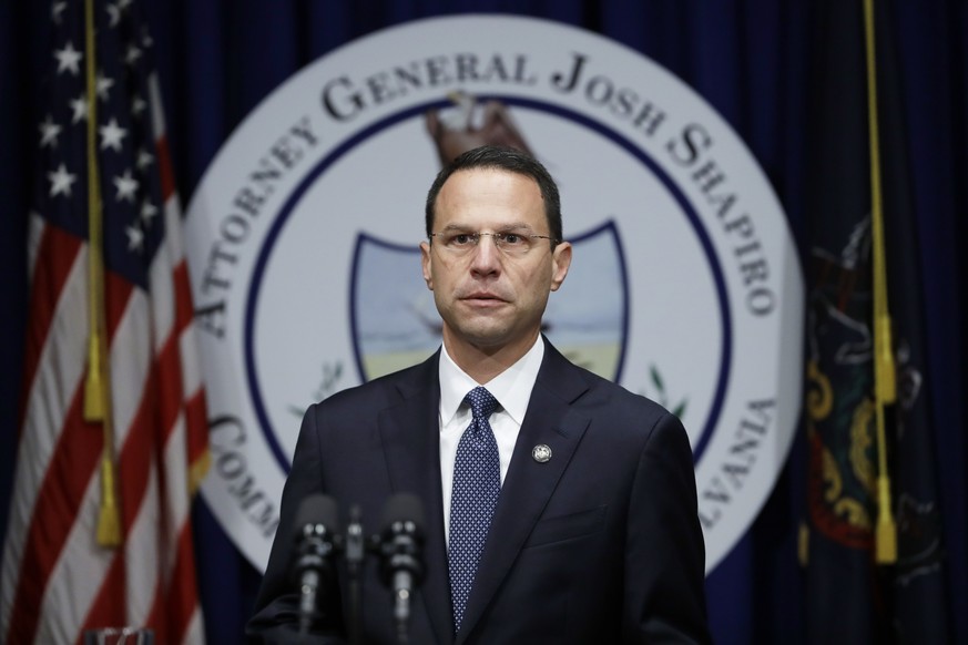 Pennsylvania Attorney General Josh Shapiro speaks during a news conference at the Pennsylvania Capitol in Harrisburg, Pa., Tuesday, Aug. 14, 2018. A Pennsylvania grand jury says its investigation of c ...