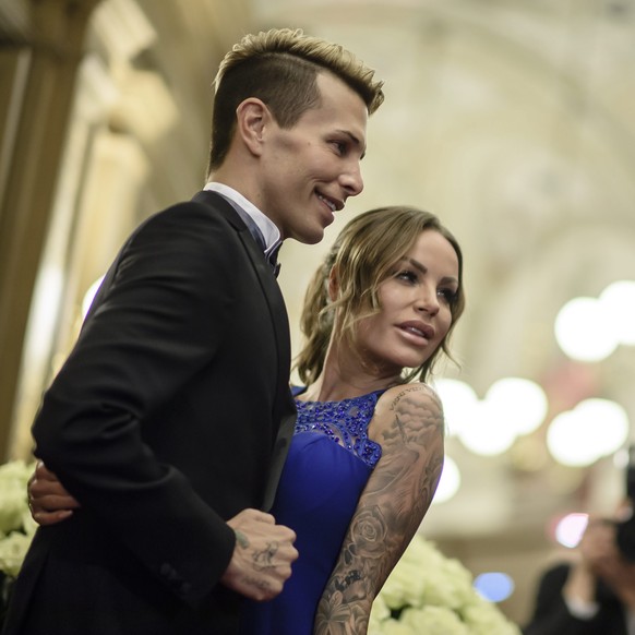 epa05769831 German model Gina-Lisa Lohfink (R) and Florian Wess pose on the red carpet during the Semper Opera Ball 2017 in Dresden, Germany, 03 February 2017. The Semper Opera Ball takes place on an  ...