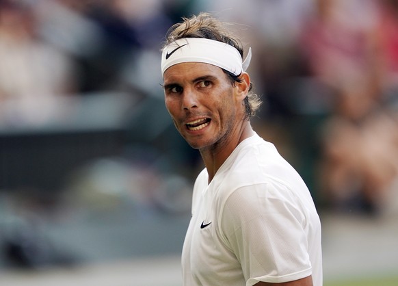 epa07713025 Rafael Nadal of Spain plays Roger Federer of Switzerland in their semi final match during the Wimbledon Championships at the All England Lawn Tennis Club, in London, Britain, 12 July 2019. ...