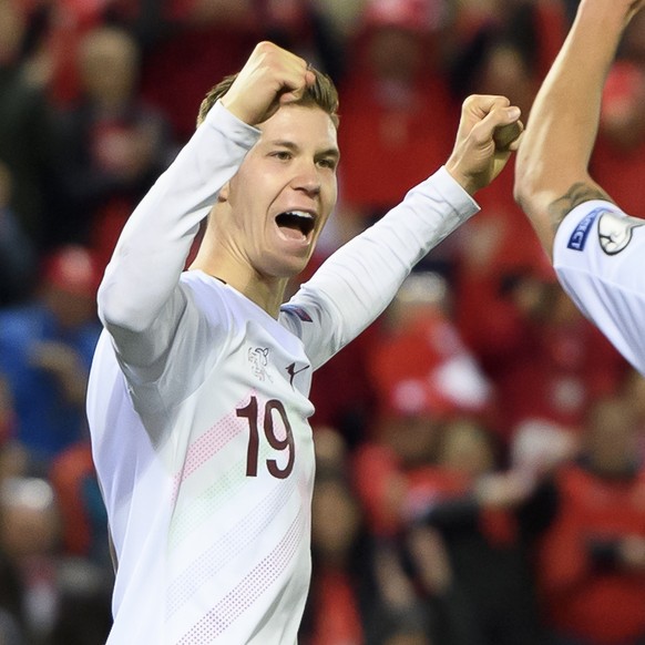 Switzerland&#039;s forward Cedric Itten, left, celebrates his goal after scoring (5-1) with Switzerland&#039;s defender Loris Benito, right, during the UEFA Euro 2020 qualifying Group D soccer match b ...