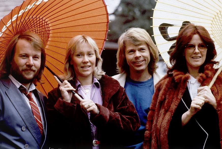 FILE - Members of the pop group ABBA, from left, Benny Andersson, Agnetha Foltskog, Bjorn Ulvaeus and Anni-Frid Lyngstad, appear in Tokyo on March 14, 1980. ABBA is releasing its first new music in fo ...