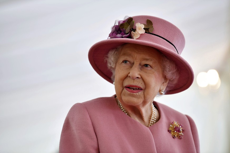 Britain&#039;s Queen Elizabeth II visits the Defence Science and Technology Laboratory (DSTL) at Porton Down, England, Thursday Oct. 15, 2020, to view the Energetics Enclosure and display of weaponry  ...