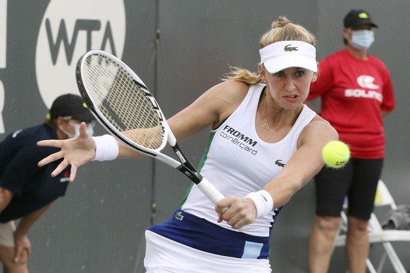 Jil Belen Teichmann returns a shot against Shelby Rogers during action in her WTA tennis tournament semifinal match in Nicholasville, Ky., Saturday, Aug. 15, 2020. Teichmann won the match 6-3, 6-2 (AP ...