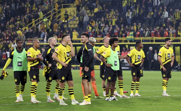 epa10834808 Dortmund players react after the German Bundesliga soccer match between Borussia Dortmund and 1. FC Heidenheim in Dortmund, Germany, 01 September 2023. EPA/Christopher Neundorf CONDITIONS  ...