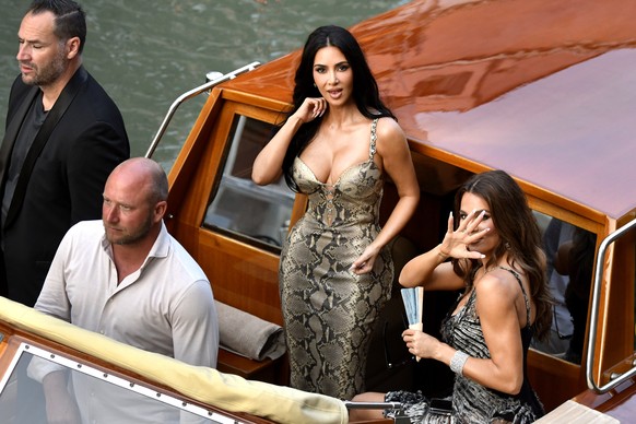 Kim Kardashian, center, and sister Khlo� Kardashian, arrive in Venice, Italy, Thursday, June 26, 2025, ahead of Jeff Bezos' wedding. (AP Photo/Luigi Costantini)
Kim Kardashian,Khloe Kardashian