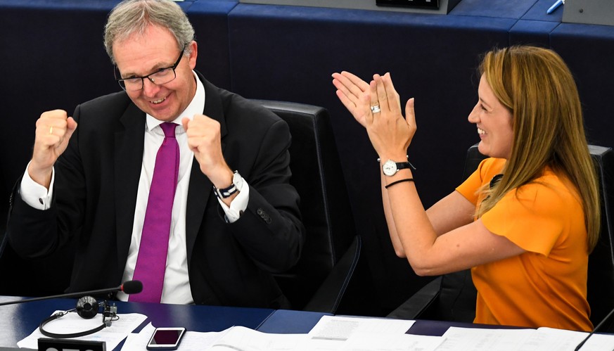 epa07014587 Rapporteur Axel Voss (L) from the Group of the European People&#039;s Party (Christian Democrats) and Roberta Metsola (R) from the Group of the European People&#039;s Party (Christian Demo ...