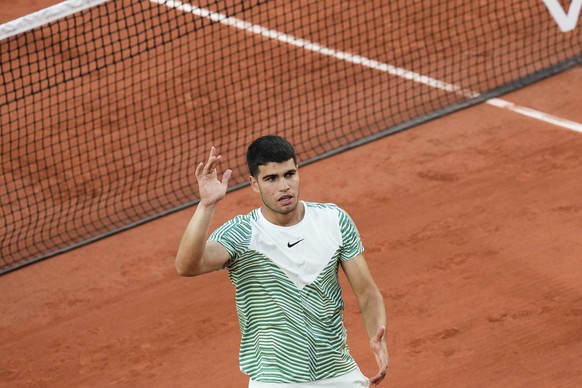 Spain&#039;s Carlos Alcaraz celebrates winning his first round match of the French Open tennis tournament against Italy&#039;s Flavio Cobolli, at the Roland Garros stadium in Paris, Monday, May 29, 20 ...