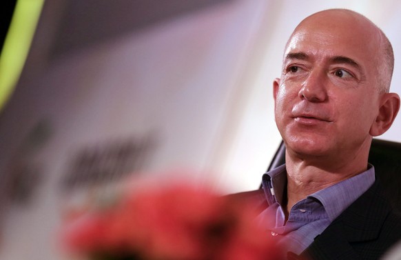 epa04425897 Jeff Bezos, founder and Chief Executive Officer of Amazon.com, attends an event in New Delhi, India, 01 October 2014. Bezos was in the Indian capital for talks on creating an enabling envi ...
