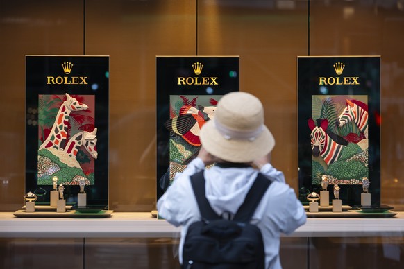A person looks at watches made by Swiss watch brand Rolex, Thursday, Aug. 7, 2025, in New York. (AP Photo/Yuki Iwamura)
Trump Tariffs