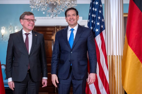 Secretary of State Marco Rubio, right, stands with Germany's Foreign Minister Johann Wadephul at the State Department, Monday, Jan. 12, 2026, in Washington. (AP Photo/Mark Schiefelbein).
Marco Ru ...
